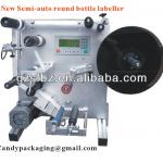 New semi-automatic round bottle labeling machine