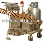 Concrete pavement crack sealing machine