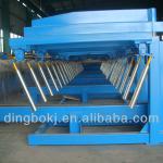 Automatic stacker for roof sheet forming machine