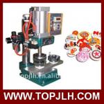 A badge/button making machine, button pin machine,badge machine