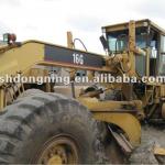 Caterpillar 16G used motor grader, with ripper working