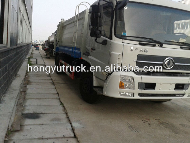 3001 - 6000L dongfeng EQ1070TJ9AD3 garbage compactor truck