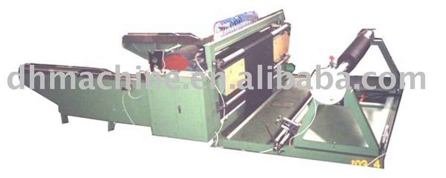 Air knife cloth rewinding slitter