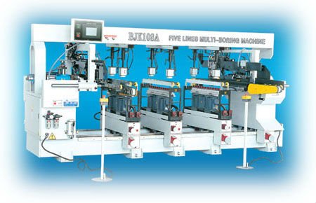 Auto feeding multiple spindle drilling machine