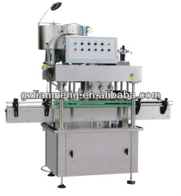 Automatic capping machine for plastic caps