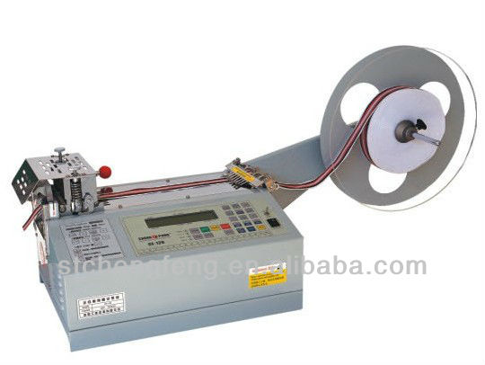 Automatic fabric ribbon tape cutting machine