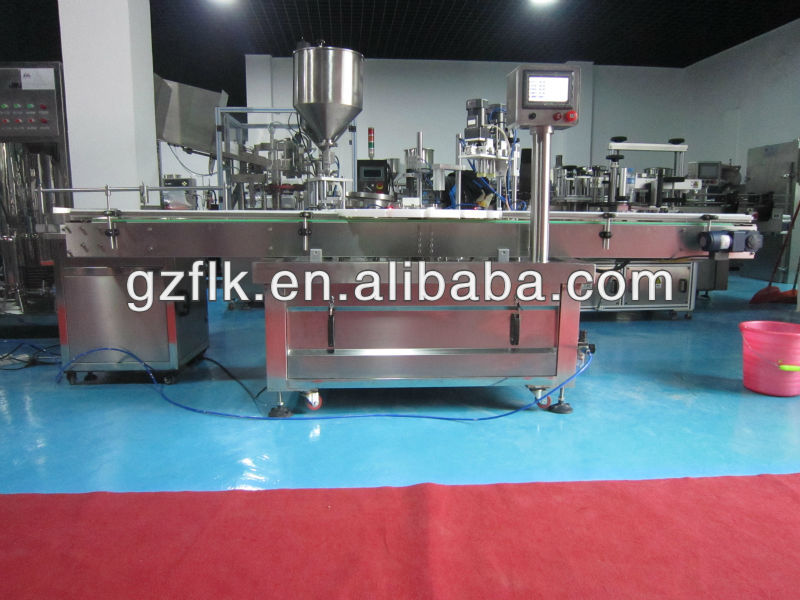 Automatic filling and capping machine