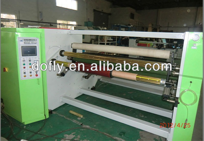 Automatic jumbo masking roll rewinding machine