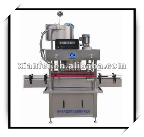 Automatic linear capping machine