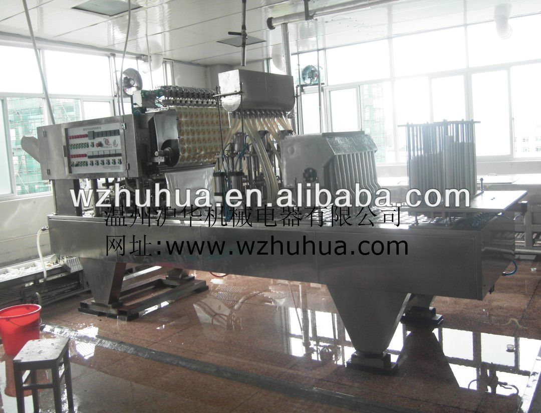 Automatic liquid particles filling and sealing machine