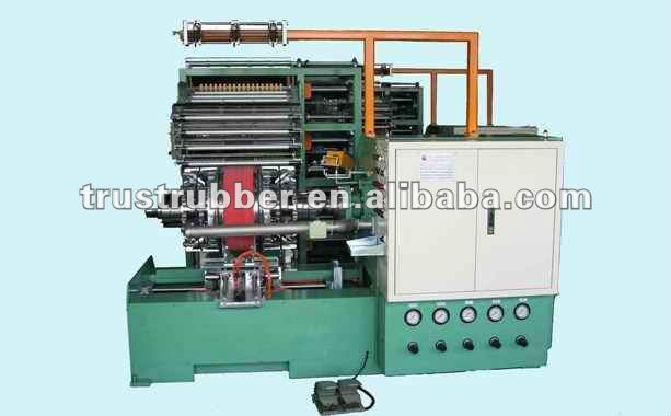 AUTOMATIC MOTORCYCLE TYRE BUILDING MACHINE