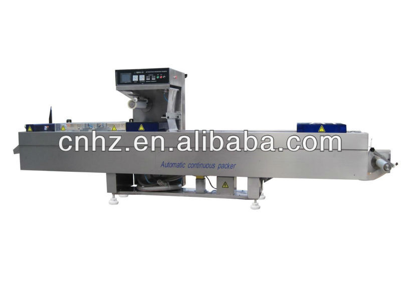 Automatic vacuum forming packing machine