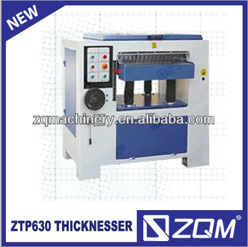 Automatic wood cutting thickness planer