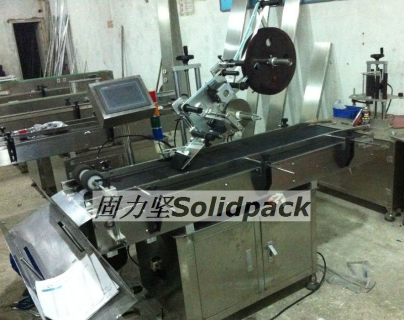 Box labeling machine