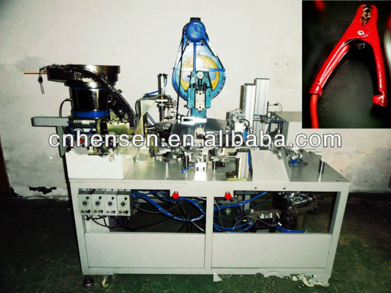 Charger clamp assembly machine