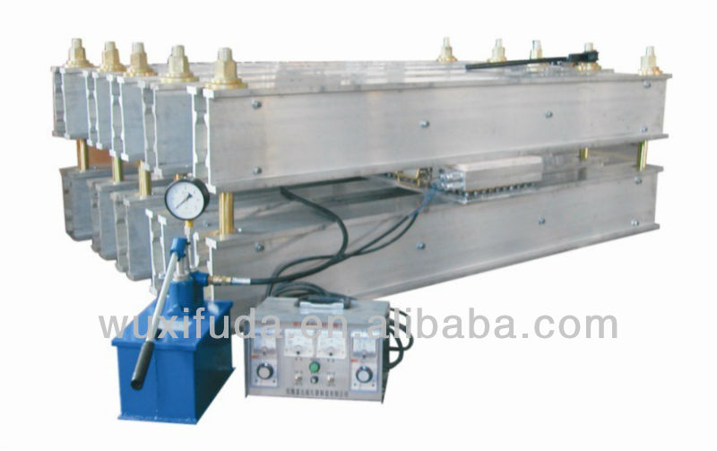 Conveyor belt splicing machine