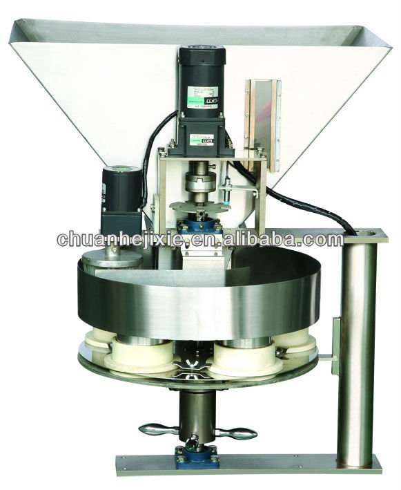 Cup metering device