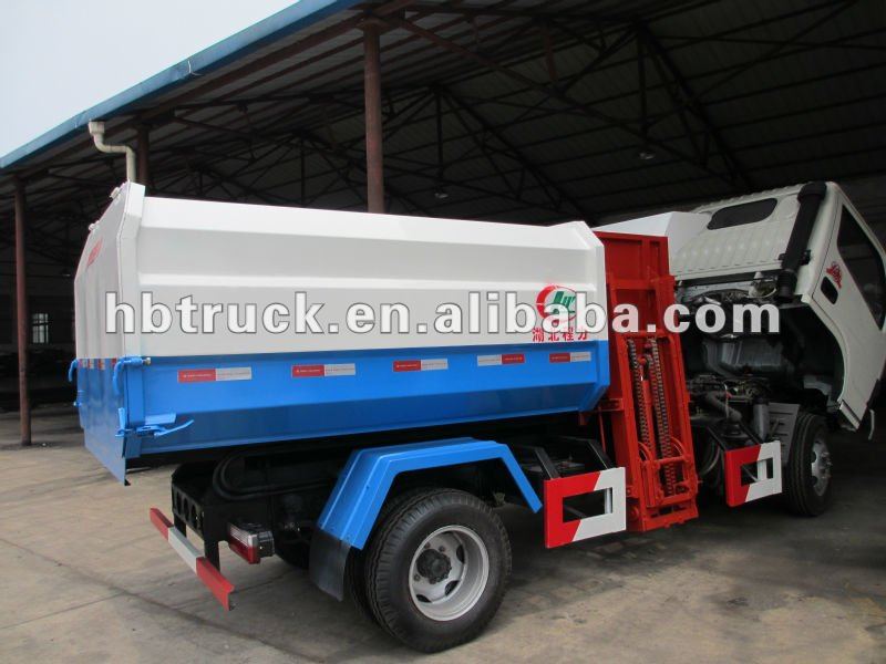 Dongfeng 8000 liters garbage truck,side barrel lading recycling