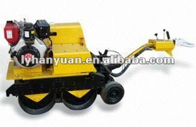 Double drum walk behind vibratory road roller