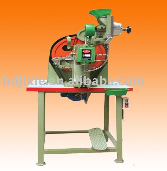 Double head eyelet machine