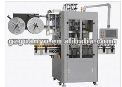 Double sleeve shrinking machine