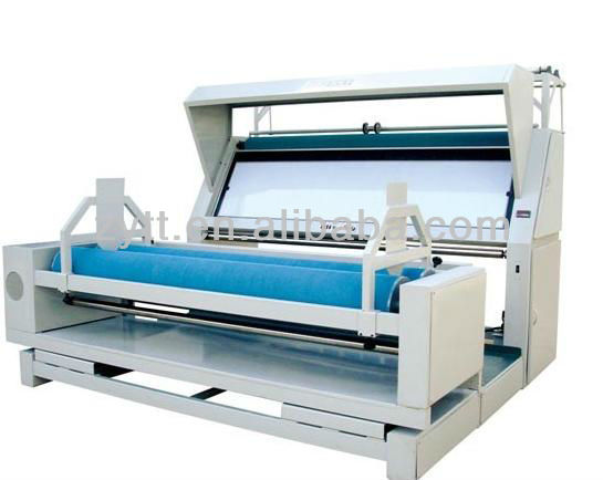 Fabric checking and packing machine