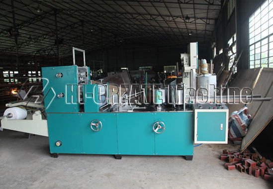 Folding napkin paper machine