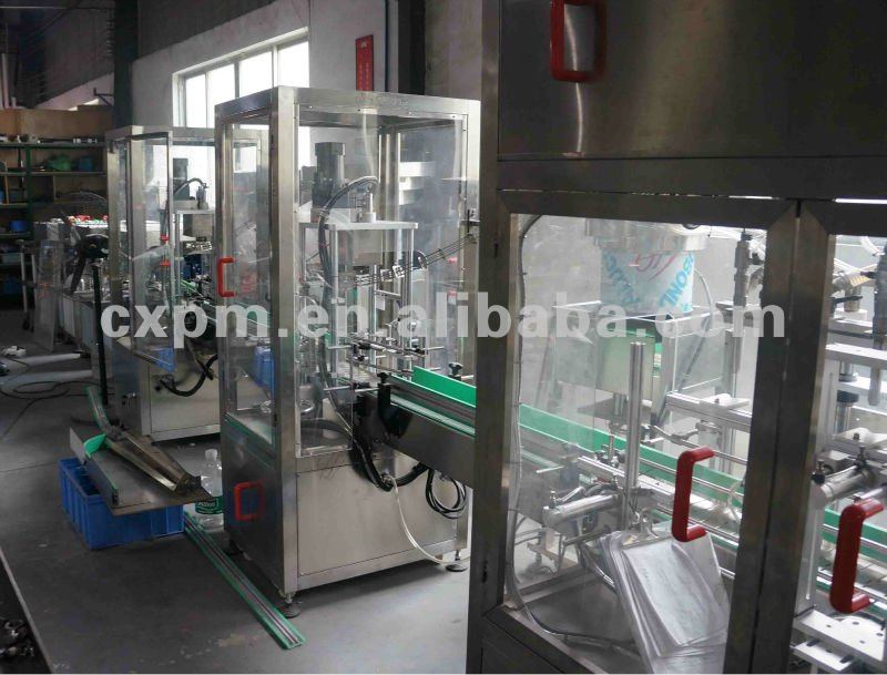 Guangzhou CX automatic filling capping labeling and sealing machine production line for oil