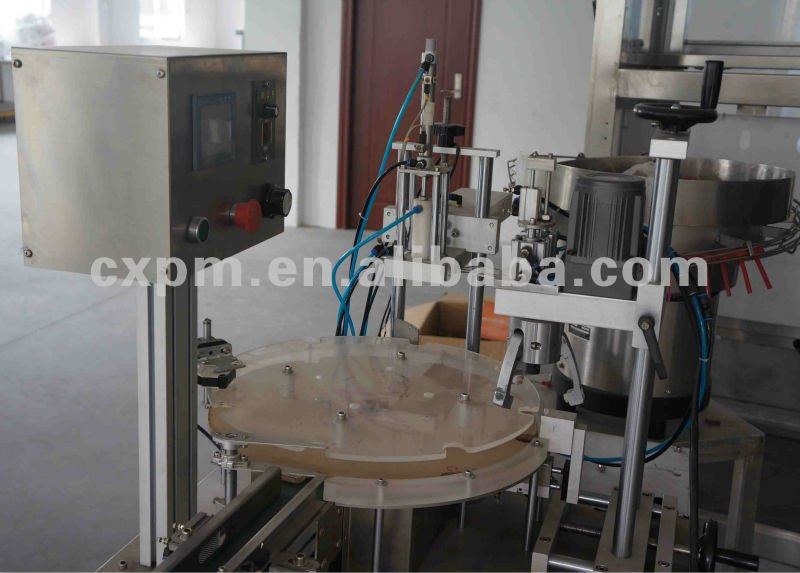 Guangzhou CX rotary jars filling and capping machine