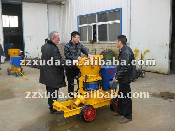 Gunite machine for concrete repairing