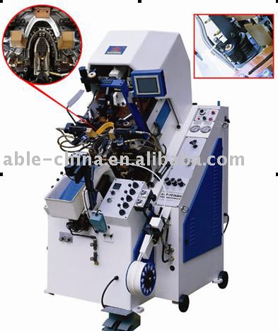 HYDRAULIC CEMENTING TOE LASTING MACHINE