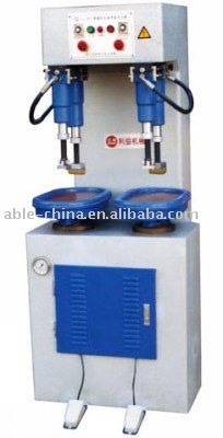 hydraulic sole attaching machine