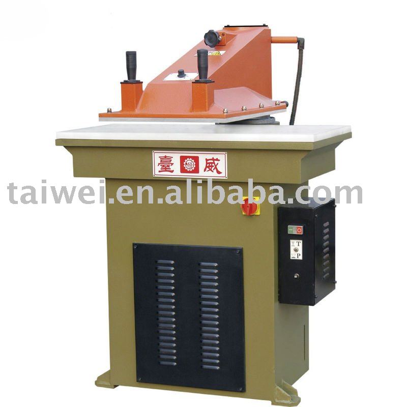 Hydraulic swing arm leather cutting machine