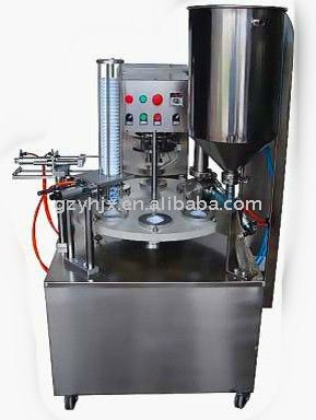 KIS-900 Rotary Type Bottle Filling & Sealing Machine (sheet film)