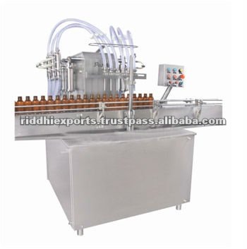 LIQUID BOTTLE FILLING MACHINE