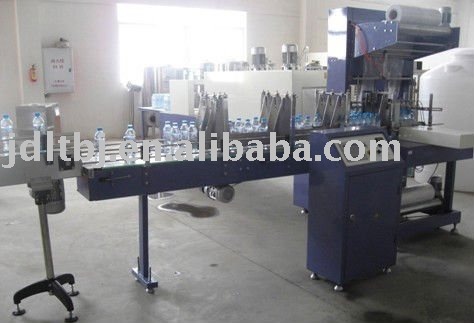 M100 automatic film collecting and shrinking packing machine