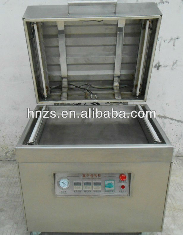 movable vacuum open cover type packaging machine