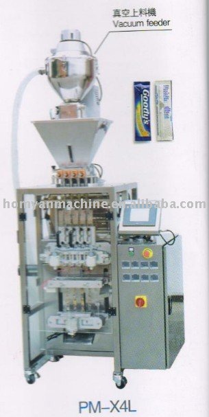 Packing machine with vacuum feeder