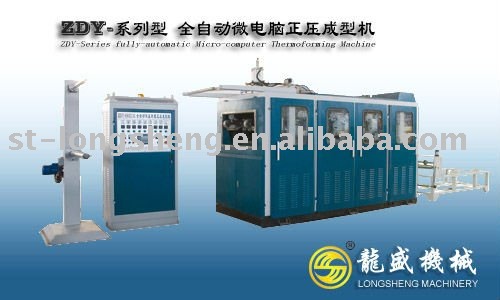 Plastic cup forming machine