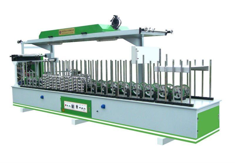 Profile wrapping machine for laminates the pvc skirting