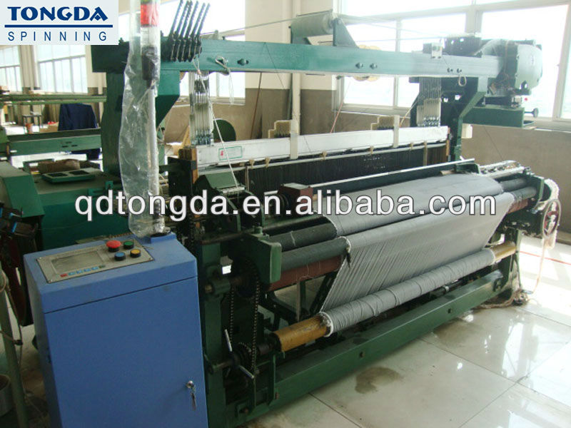 rapier loom for weaving light medium heavy fabric