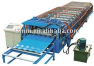 Roof tile forming machine