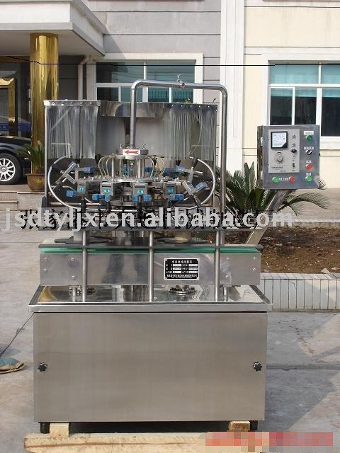 Rotary automatic bottle washing machine