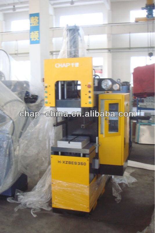 Rubber belt transfer molding press