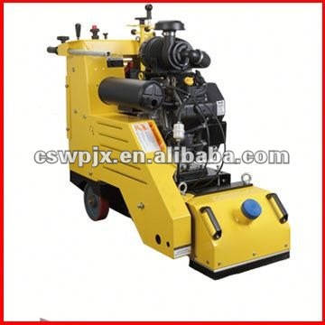 Self propelled concrete scarifier