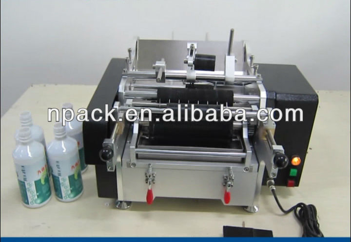 Semi-automatic glue labeling machine