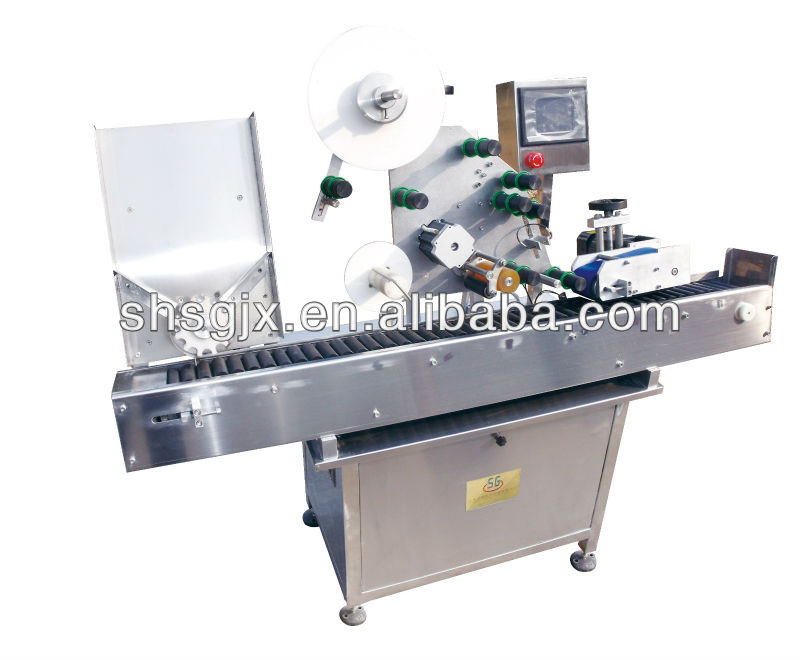 SGWT-Horizontal sticker labeling machine. Round bottles labeling machine.