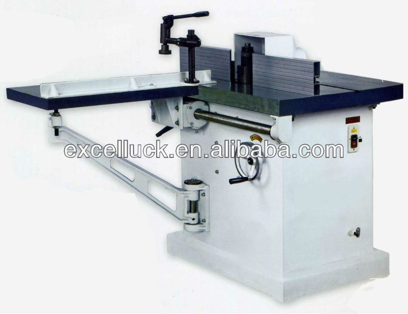 Sliding table wood shaper