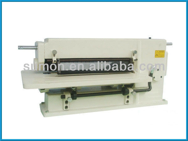 Slitting machine for slitting leather ,artifical ,plastic cloth