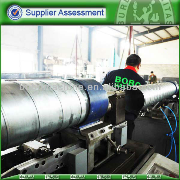 Spiral tube forming machine